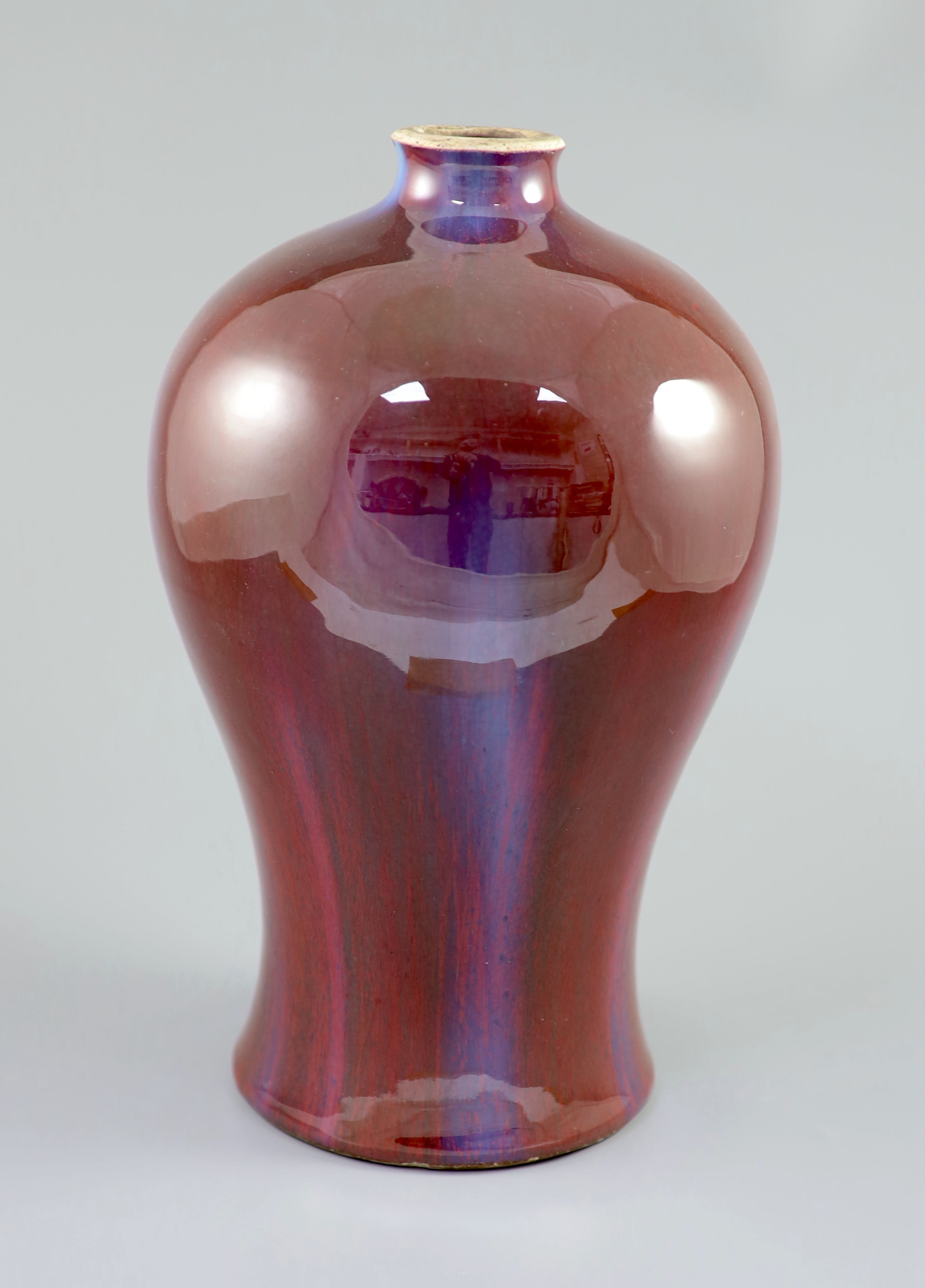 A large Chinese flambe meiping, 18th century, 35cm high, rim ground off